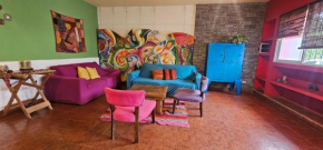 Casa una habitacion con tres camas,patio, totalmente equipada